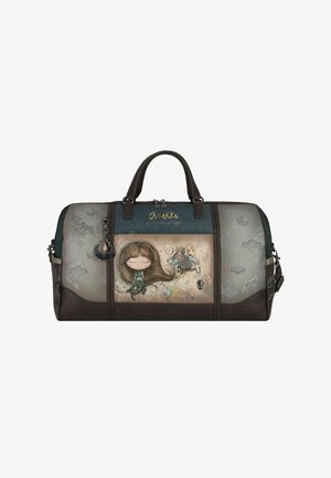 Bruine duffelbag met teal accenten, met een speelse cartoonmeisje grafiek en de tekst "Dromen". Gemaakt van synthetisch materiaal met textuurdetails.
