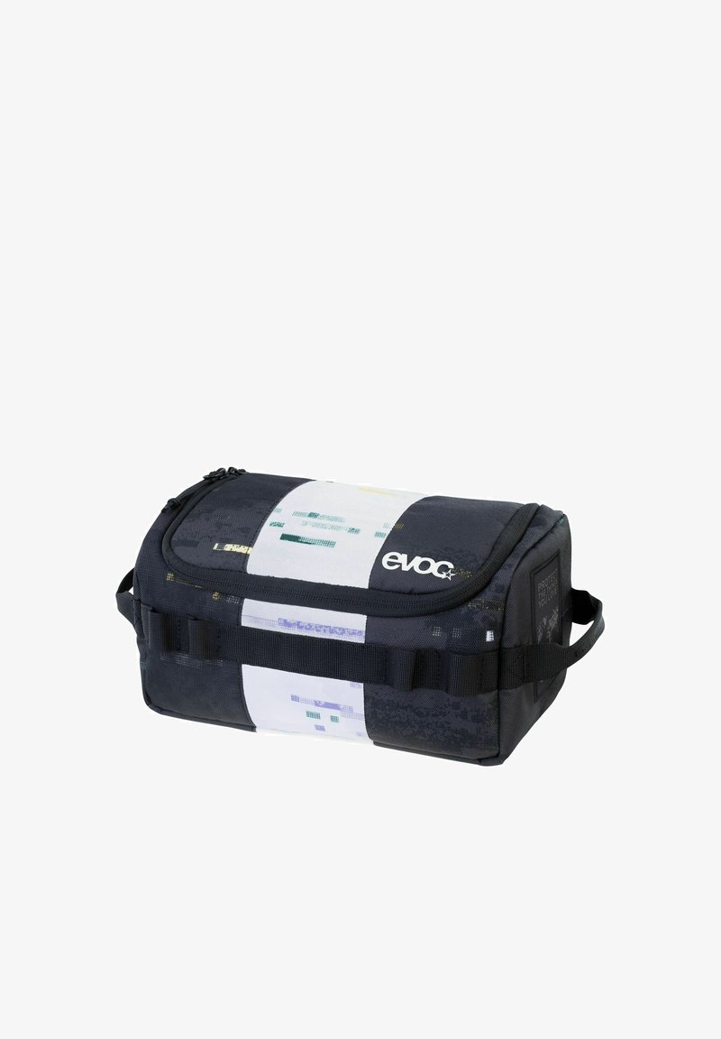 Bolsa de almacenamiento Evoc de forma rectangular, fabricada con tela negra que presenta un estampado geométrico multicolor y un asa lateral para facilitar el transporte.