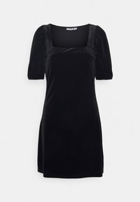 Svart sammetsminiklänning med fyrkantig halsringning och puffärmar. Mjuk textur, figurnära siluett med en slät yta.