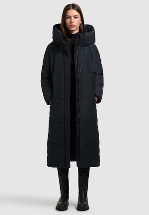 Langer schwarzer Puffer-Mantel mit abnehmbarem Kapuzen, gesteppter Gestaltung, Frontreißverschluss und Druckknopfverschluss sowie seitlichen Taschen. Wasserdichtes Material.