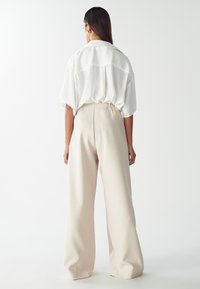 WILLA CROWN PANTS - Hlače - ecru