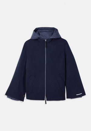 Navy blue zip-up jacket with wide sleeves, two front pockets, and a padded hood.