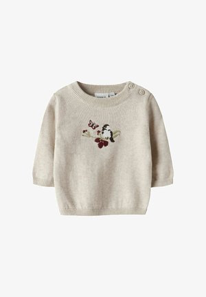 Bež džemper za bebe s dugim rukavima, dva gumba na ramenu i vezom ptice, leptira i grane s cvijećem na prednjoj strani.