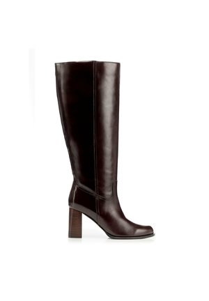 Botte haute jusqu'au genou en cuir marron, avec un bout rond et un talon empilé, présentant une finition lisse et des détails de couture discrets.