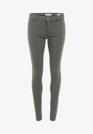 Olive green skinny jeans made of stretch cotton, featuring a front button closure, five-pocket design, and sleek, smooth texture.