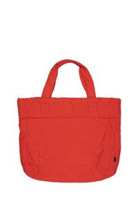 Borsa tote rossa trapuntata con due manici. Presenta una forma rettangolare piatta e un motivo testurizzato di cerchi sovrapposti.
