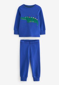 Blå bomulds loungewear sæt med en langærmet top med grøn krokodille broderi og matchende blå bukser med ribbede manchetter.