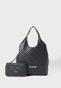 Black quilted handbag and matching pouch with gold "Love Moschino" plaques, displayed on white background.