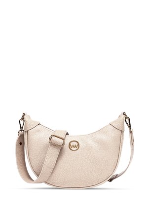 Leather crossbody bag in light beige, crescent shape with textured surface, adjustable strap, gold hardware, and logo accent.