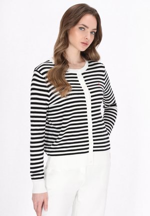 Black and white striped cardigan with a round collar, button front, and ribbed cuffs. Subtle red logo detail on the chest. Soft knit texture.