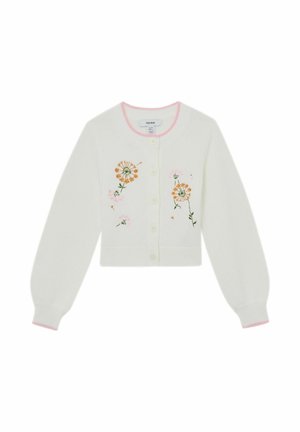 Bela gumbasta jopa z dolgimi rokavi, roza obrobo in izvezenimi oranžnimi in roza cvetličnimi vzorci na sprednji strani.