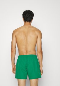 Lacoste Plaukimo šortai - rocket/green