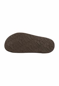 Gummisula i mörkbrunt med en texturerad yta som har geometriska mönster och olika grepelement för bra fäste.