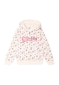 Sudadera con cremallera de color crema claro, con un patrón floral rosa, logo brillante de "Creeks" y capucha. Está hecha de un material suave con puños acanalados.