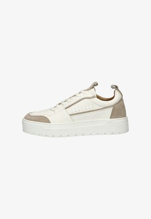 White leather sneaker with beige suede accents, round toe, flat white sole, and perforated side detailing. Features lace-up design and heel tab.