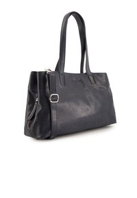 Námornícky kožený tote bag s dvěma pevnými uchy, boční kapsou na zip a jemnými švy podél horních okrajů a švů.