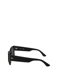 Lunettes de soleil noires avec une texture géométrique sur les branches, des accents dorés et une monture carrée. Les verres sont sombres et brillants.