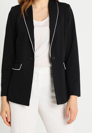 Schwarze Blazer mit weißer Paspelierung, Ein-Knopf-Verschluss und zwei Vorderaschen. Aus leichtem Stoff mit taillierter Passform.