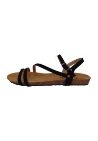 Sandalias de ante negro con dos correas ajustables, una plantilla de corcho y una suela exterior de goma texturizada. Presenta accesorios metálicos en la correa.