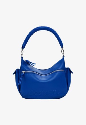 Blaues Lederhandtasche mit einem gerippten Griff, ausgestattet mit einer vorderen Reißverschlusstasche und einem geprägten Logo. Kurvenförmige Form mit Seitentaschen.