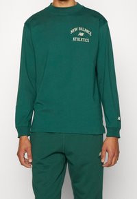 New Balance Långärmad tröja - dark green