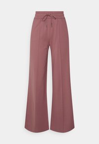 Calças largas numa cor rosa pó. Feitas de um tecido suave com uma cintura elástica e cordão, apresentando pregas para um detalhe adicional.