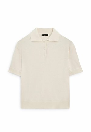 Kremowa koszulka polo z krótkim rękawem, wykonana z dzianiny, z trzema guzikami oraz ściągaczami na kołnierzyku, mankietach i dolnym brzegu, ułożona na płasko na białym tle.