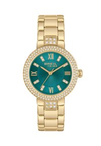 Montre-bracelet dorée avec un cadran turquoise, accents ressemblant à des diamants, chiffres romains et un cadran texturé ; bracelet en métal à maillons.
