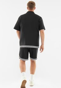 Johnny Urban PARKER - Pantaloni de trening - black