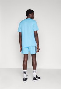 adidas Sportswear Športové šortky - semi blue burst