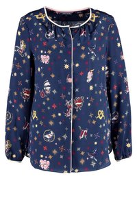 Blusa navy con maniche lunghe, scollatura elastica e rifiniture bianche. Presenta stampe colorate ispirate ai tatuaggi e motivi a stella in tutto il tessuto.
