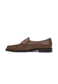 Brown leather loafers with a rounded toe, gathered detailing on the front, and a flat black sole. Smooth texture with minimal hardware.