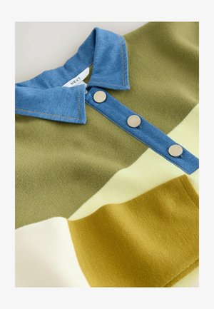 Button-up top with a blue denim collar and three silver buttons. Features green, yellow, and cream sections; soft texture.