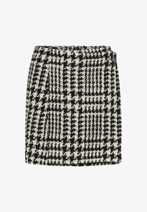 Sorte og hvide houndstooth-mønstrede nederdel i vævet stof. Har lige snit, taljebånd og lynlås i siden.