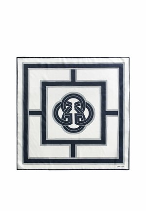 Foulard carré blanc avec une bordure géométrique bleu marine et un motif de nœud entrelacé en forme de G au centre, logo GANT dans le coin.