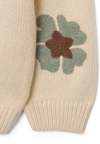 Beige Strickpullover mit einem grünen und braunen Blumenmuster auf der Vorderseite. Strukturierte Wolle mit gerippten Bündchen.