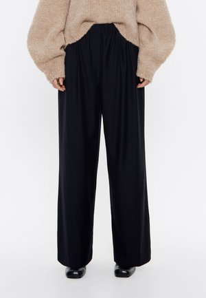 Pantalones - black