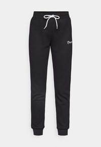 Black sweatpants made of soft, textured fabric. Features a white drawstring, cuffed ankles, and a small embroidered logo on the thigh.