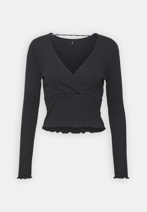 Svart longsleeve omslagstopp med V-hals, tettsittende design, teksturert stoff og volangdetalj i kanten, egnet for uformelle anledninger.