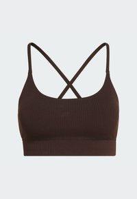 Brązowy prążkowany biustonosz typu bralette z cienkimi, krzyżującymi się ramiączkami. Charakteryzuje się gładką teksturą i dolną taśmą zapewniającą wsparcie.