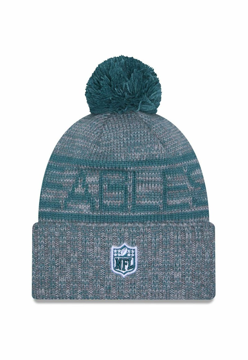 Cappello lavorato a maglia in teal e grigio con un motivo testurizzato e un pom-pom sulla parte superiore, caratterizzato da un patch con il logo NFL sul risvolto.