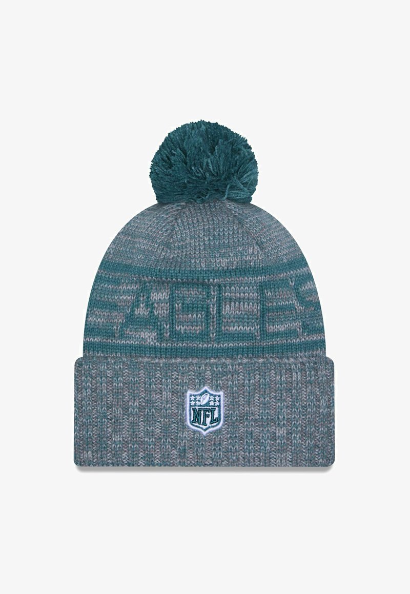 Cappello lavorato a maglia in teal e grigio con un motivo testurizzato e un pom-pom sulla parte superiore, caratterizzato da un patch con il logo NFL sul risvolto.