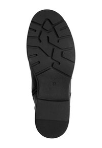 Semelle de chaussure en caoutchouc noir présentant un motif de grip texturé et une taille indiquée comme 37. Le design comprend des rainures angulaires pour une meilleure traction.
