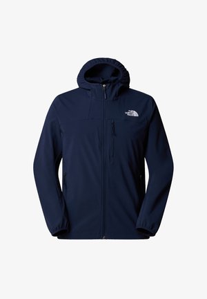 Marineblå softshell-jakke med lynlås foran, justerbar hætte, lynlåslommer og et logo på brystet. Glat tekstur, åndbart materiale.