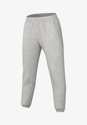 Light gray sweatpants made of soft fabric, featuring an elastic waistband with drawstring, side pockets, and tapered cuffs. Nike logo displayed.