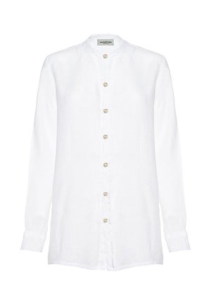 Camicia di lino bianca con colletto alla coreana, maniche lunghe e apertura frontale con bottoni. Caratterizzata da sette bottoni rotondi di colore chiaro. Texture liscia.