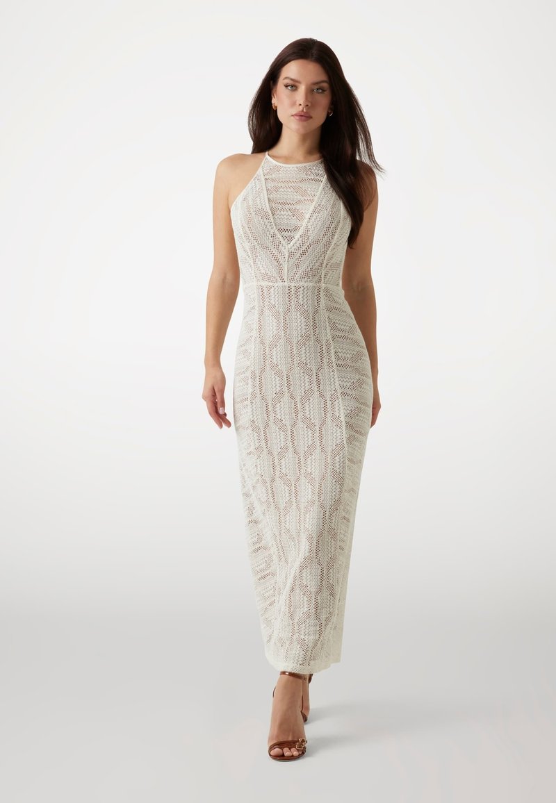 Maxikleid aus impact-gewebtem Strick in Off-White von Henry, mit Halterneck, figurbetontem Oberteil und strukturiertem geometrischem Muster.