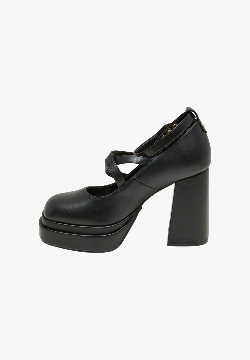 Cizme cu toc platformă negre, cu vârf rotund, design cu curea încrucișată și toc gros. Fabricate dintr-un material asemănător cu pielea, cu textură netedă.