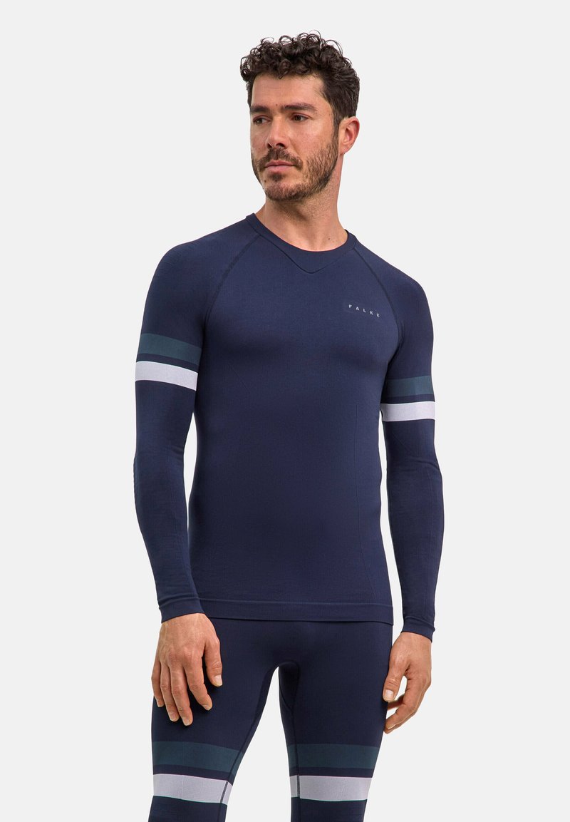 Marineblaue, langärmlige Sportshirt mit V-Ausschnitt, versehen mit horizontalen Streifen in Dunkelgrün und Weiß an den Ärmeln. Glatte Textur.