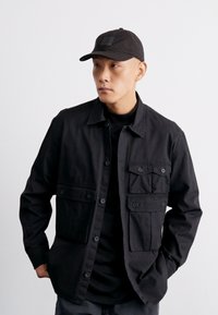 Carhartt WIP TRUMAN UNISEX - Naģene - chocolate/black